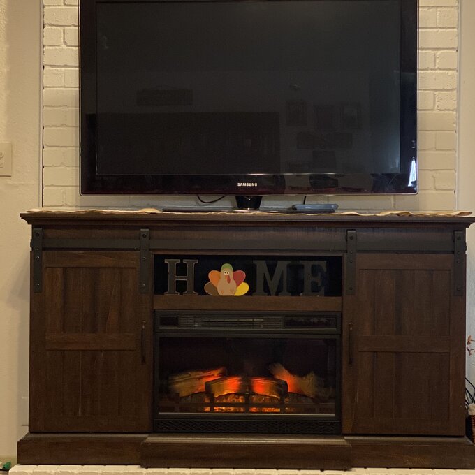 White Oak tv fireplace stand in living room